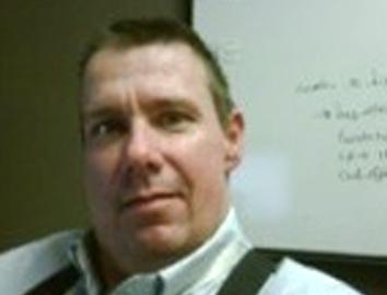 Headshot of Gary Angel